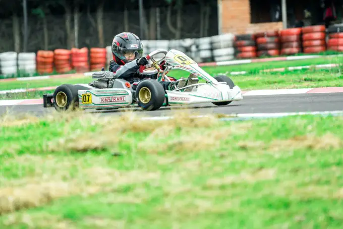 A child rides a go-kart